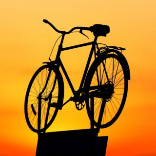 Ein Fahrrad im Sonnenuntergang